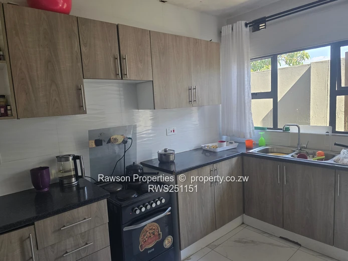 Gated 5-Bed Home with Modern Kitchen in Damofalls
